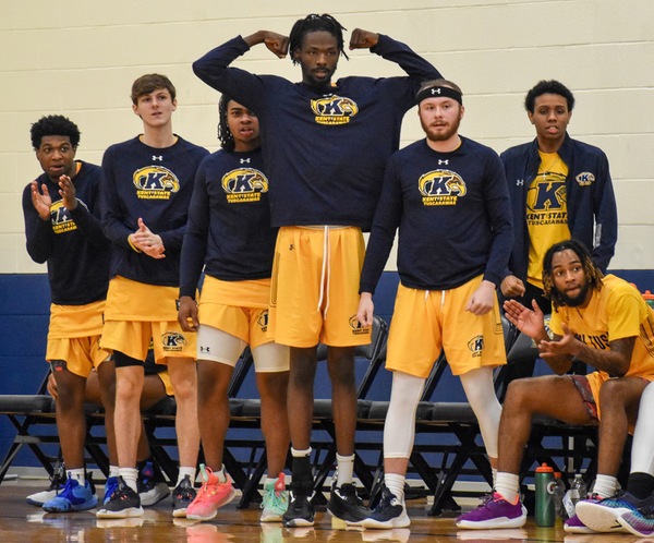 The KSU Tusc bench reacts to strong play against Andrews University. (Photo by Lindsey Nicholson)