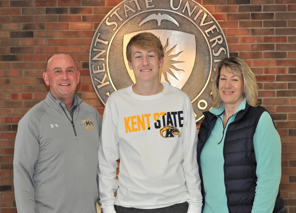 Nick Reeder (center) is pictured with Coach Brindley and his mother Laura.